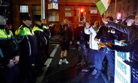 Police and protesters in Dublin during a riot last November that was sparked by a stabbing attack in the city.