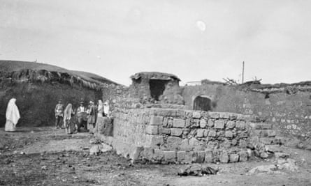 Surafend, Palestine circa 1918. An Australian soldier with some locals inside the ruins of an ancient building site.