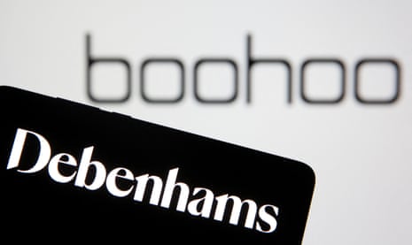 Debenhams logo is seen on smartphone in front of a displayed Boohoo logo.