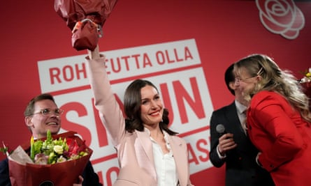 Finland’s outgoing prime minister, Sanna Marin, is cheered by her supporters during an election party in Helsinki.