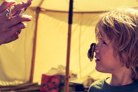 Moth on a boy’s nose