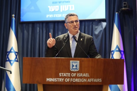 Israel’s foreign minister, Gideon Saar, speaking on stage.