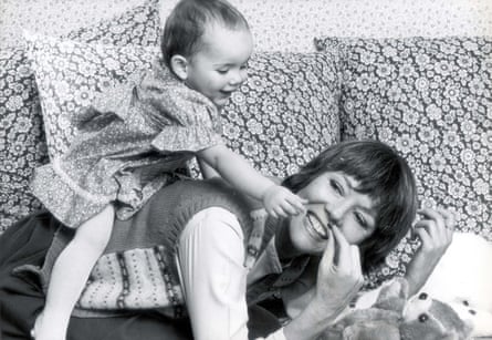 Stirling as a baby with her mother. She is sat on her mother’s back