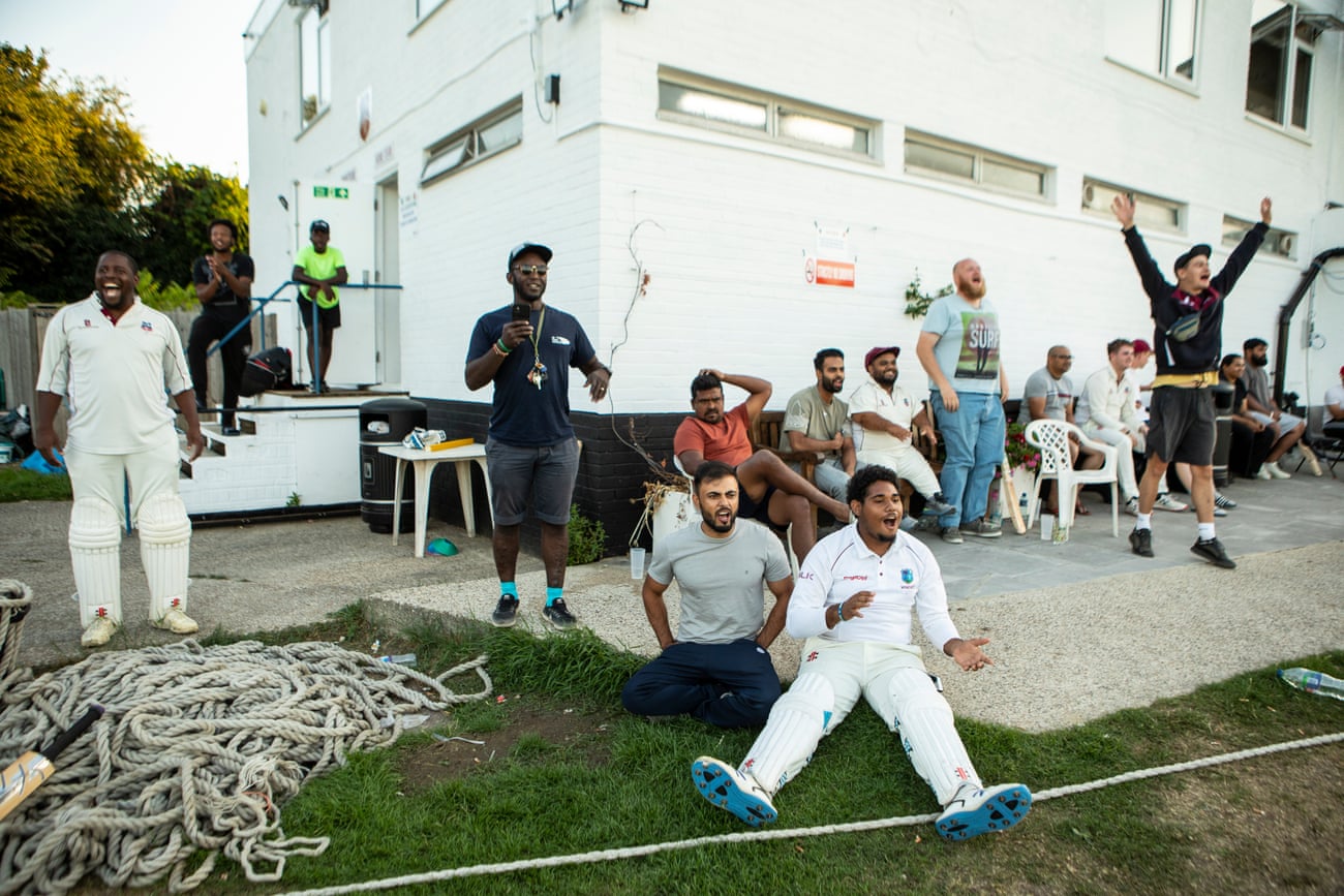 The Catford & Cyphers players are absorbed by the match against London Combined – their side won by two wickets in the last round.