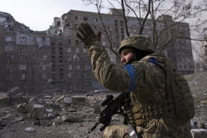 A Ukrainian serviceman guards his position in Mariupol, Ukraine. Ukrainian military says Russian forces have captured the eastern outskirts of the besieged city of Mariupol. Mariupol has been under siege for over a week, with no electricity, gas or water