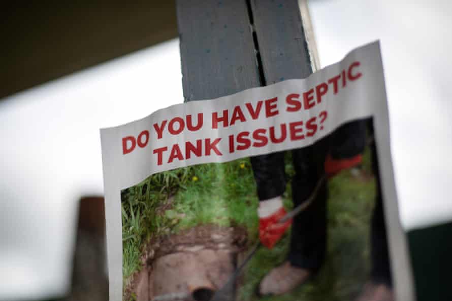 A posted flier inquires about septic problems in the Rancho Vista community near San Marcos, Texas.