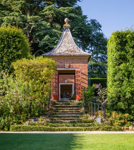 A stunningly situated gazebo, with steps leading up to it. at Hidcote.