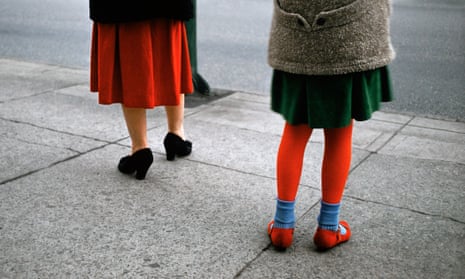 Red Stockings, 1961, by Fred Herzog. It is the colour tones that entrance. In this instance, the deep red of the woman’s pleated dress is echoed in the girl’s tights and shoes.