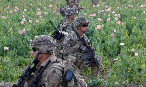 US and Afghan soldiers patrol in Zharay district in Kandahar province, southern Afghanistan.