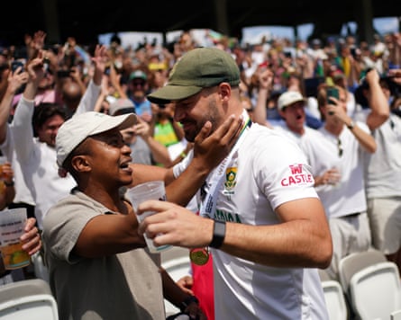 South Africa’s batting hero Aiden Markram has a drink in celebration with fans after an emotional triumph at Lord’s.