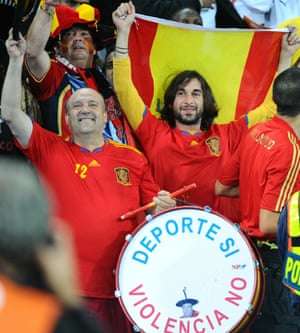 Supporters celebrate at the end of the World Cup semifinal match between Germany and Spain in 2010.