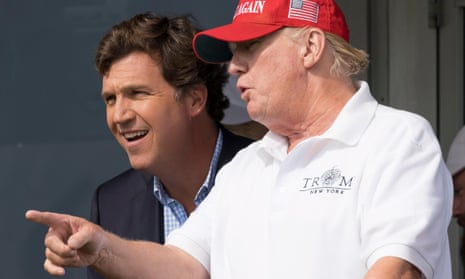 Tucker Carlson, left, and former president Donald Trump at the Trump National Golf Club in Bedminster, New Jersey, in July 2022.