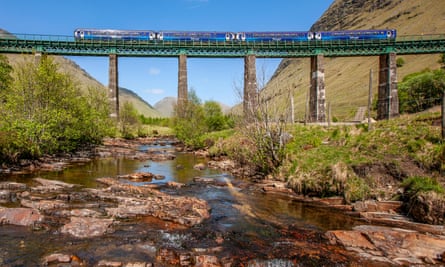 The Mallaig train from Glasgow runs over Horseshoe Viaduct near Auch.