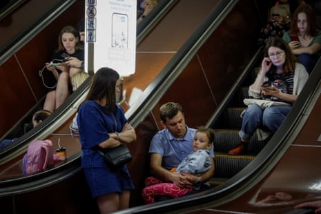 Kyiv residents shelter inside a subway station during yesterday’s Russian daytime missile attack on Ukraine’s capital.