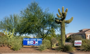 A sign reads “truth over lies. Biden for president” in Scottsdale, Arizona.