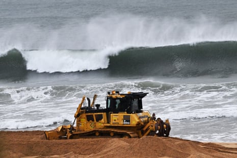 Workers operate heavy machinery to stabilise Wamberal beach on the Central Coast on Wendesday.