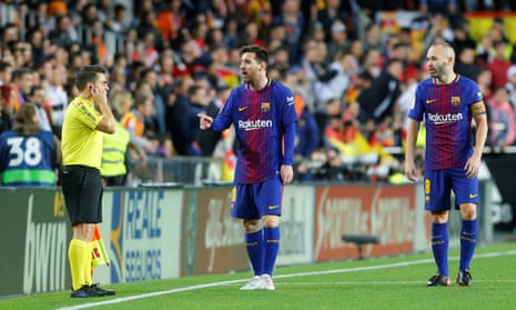 Lionel Messi remonstrates with the assistant referee