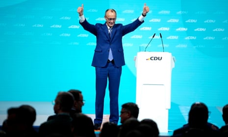 Friedrich Merz, CDU candidate for chancellor and CDU federal chair, celebrates after his speech in Berlin.