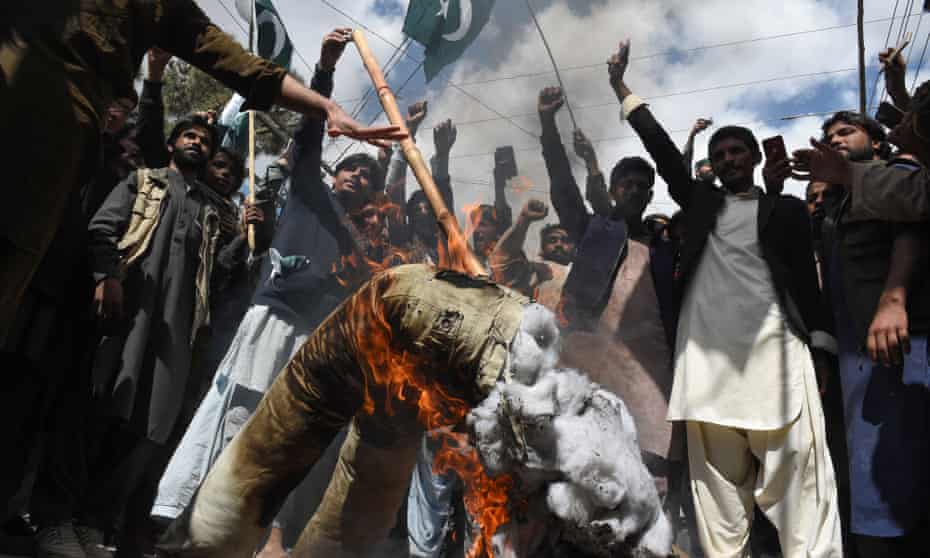 Pakistani protesters burn an effigy of the Indian prime minister, Narendra Modi.