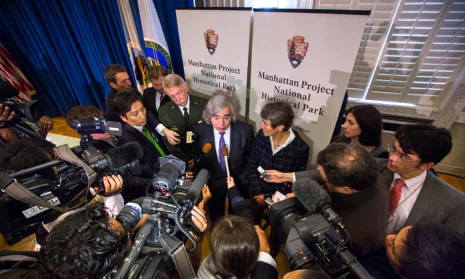 Sally Jewell and Ernest Moniz speak to members of the Japanese media after holding a signing ceremony to establish the Manhattan Project national historic park.