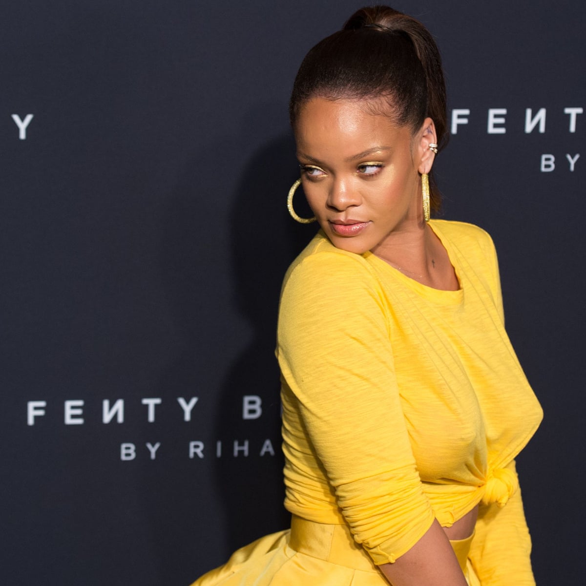 rihanna yellow shirt dress Rihanna wore a 'I Hate Rihanna' t-shirt for her 30th birthday