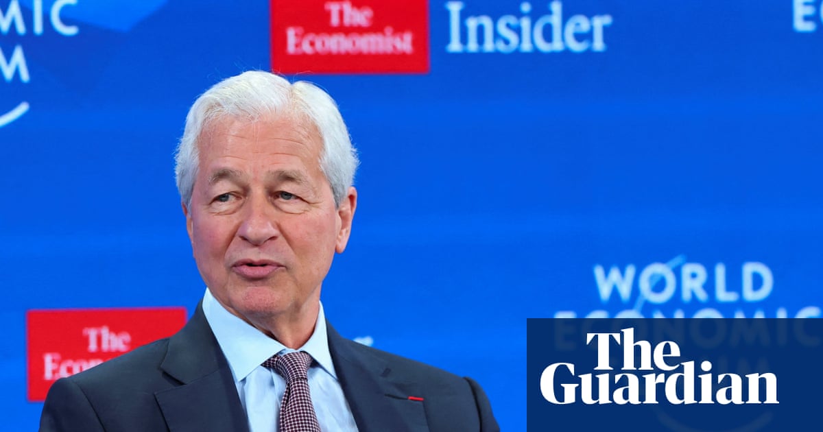 Jamie Dimon staring into the middle distance, wondering how his life choices led to being sued for $5bn by the guy who told people to march on the Capitol and then got mad when banks noticed.