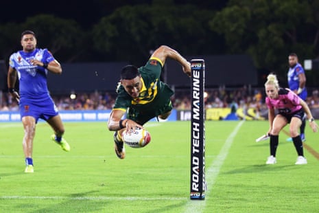 Up, up and away: Valentine Holmes bags his fourth try of the night. (Photo by Matt King/Getty Images)