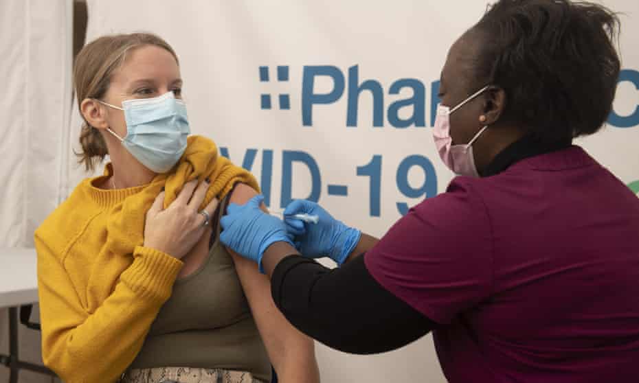 A woman receives a Covid vaccination in Maidstone, Kent