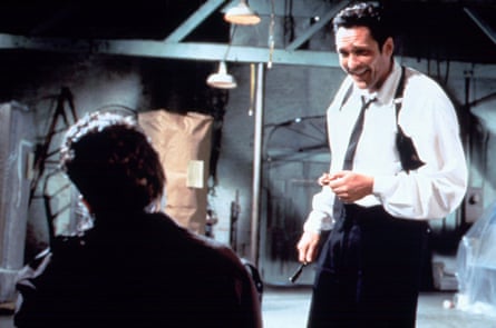 Michael Madsen in Reservoir Dogs, which used the song Stuck in the Middle With You to great effect.