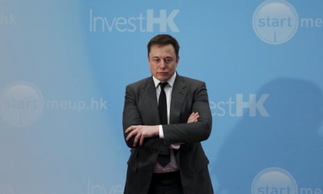 Tesla Chief Executive Elon Musk standing on the podium as he attends a forum on startups in Hong Kong.