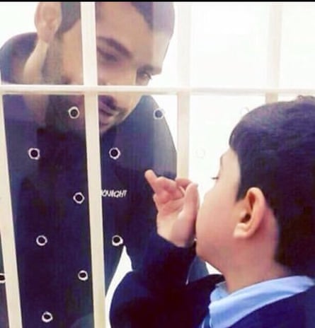 Death-row prisoner Mohammed Ramadan, pictured in prison in Bahrain with his son, was allegedly tortured.