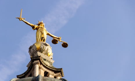 Justice statue over the central criminal court on London’s Old Bailey
