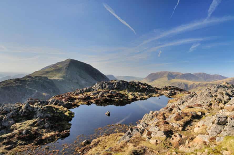 The summit of Haystacks with High Crag and Grasmoor in the background.
