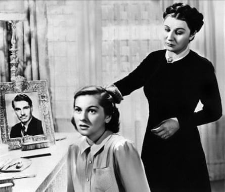 Joan Fontaine as the second Mrs de Winter with Judith Anderson as Mrs Danvers in Rebecca.