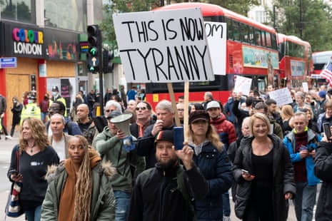 Protesters take part in the March For Freedom demonstration organised by Stand Up X in London. The group are against the Covid-19 restrictions, including the wearing of face masks and the erosion of civil liberties.