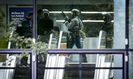 Dutch police officers secure the Erasmus University medical centre.