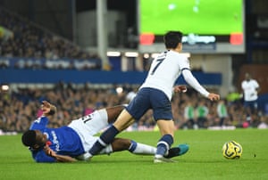 Son Heung-Min is caught by Yerry Mina.