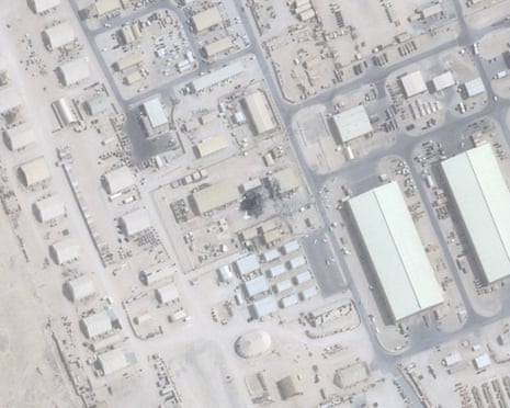 This satellite image from Planet Labs PBC shows damage after an Iranian attack at the Al Udeid Air Base outside of Doha, Qatar, June 25, 2025.
