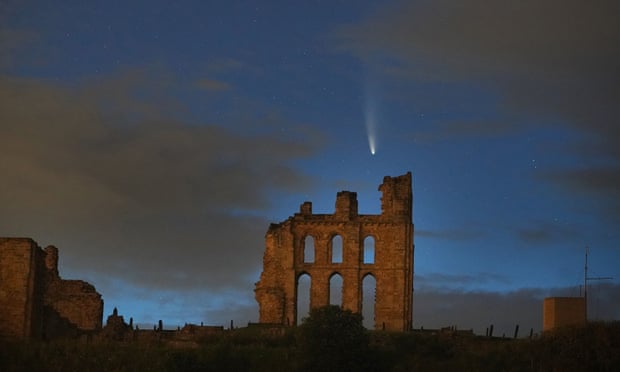 a comet passes over Tynemouth Priory.