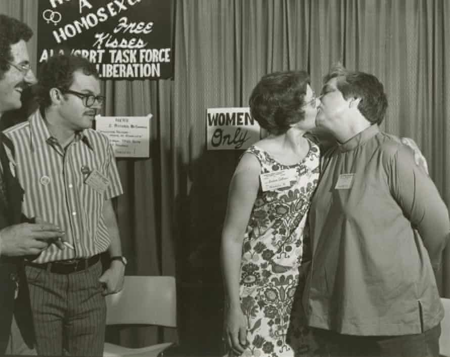 Barbara Gittings (left) and Isabel Miller kissing at a booth called ‘Hug a Homosexual’ at the 1971 American Library Association convention.