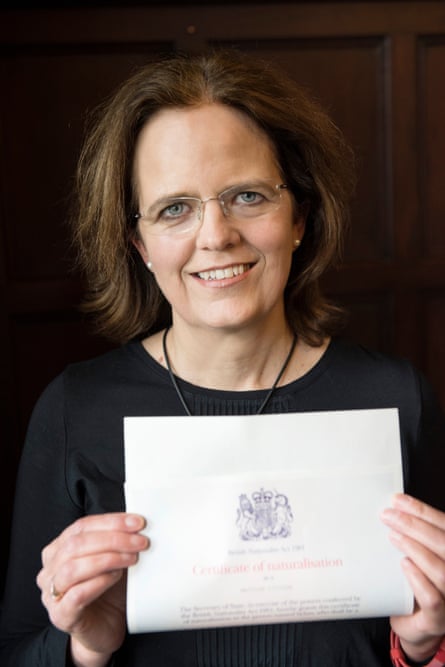 Monique Hawkins holds her British citizenship certificate  on 5 May 2017.