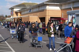 People queuing e at a Tesco Extra in Osterley, London, earlier this month