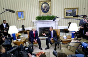 U.S. President Barack Obama, right, speaks as U.S. President-elect Donald Trump listens during a news conference in the Oval Office of the White House in Washington, D.C., U.S., on Thursday, Nov. 10, 2016.
