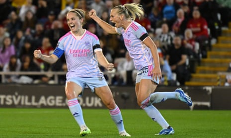 Stina Blackstenius of Arsenal celebrates after scoring the team's first goal with Kim Little against Manchester United.