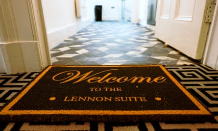 A welcome mat outside one of the suites that says 'Welcome to the Lennon suite'