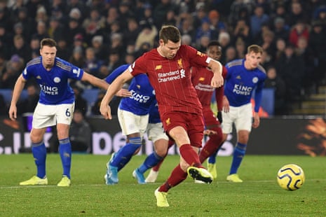 James Milner slots the ball home from the penalty spot for Liverpool’s second goal of the game.