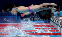 Guo Jincheng of China dives in