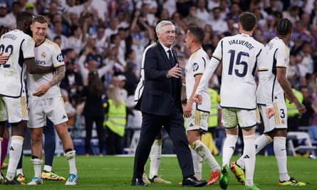 Carlo Ancelotti with his players after Real Madrid’s win over Barcelona in April