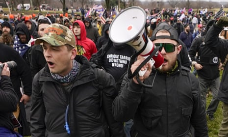Proud Boys walk toward the Capitol in support of  Donald Trump