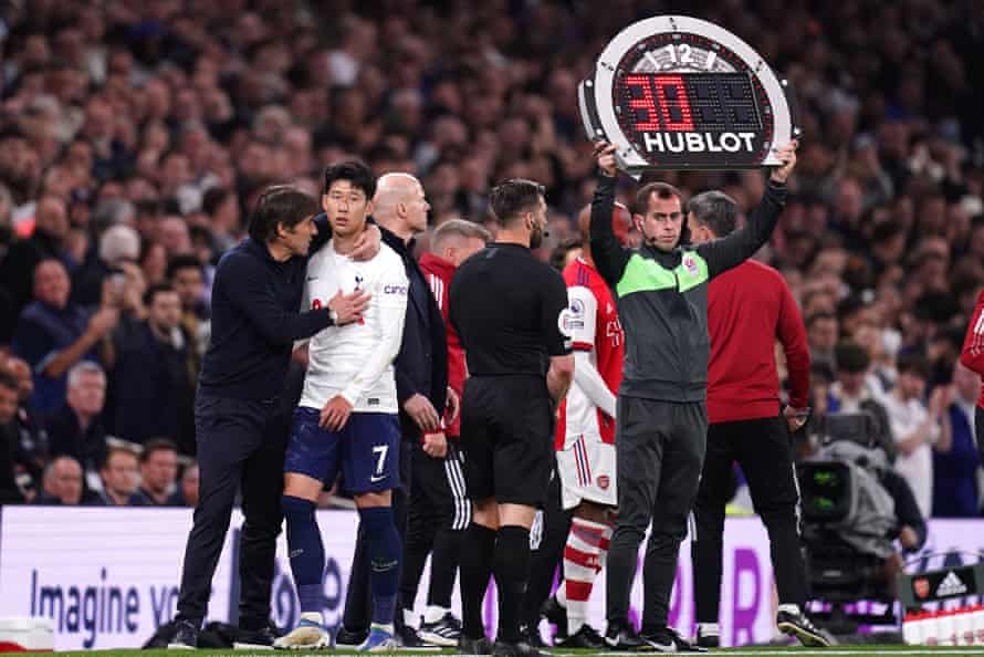 A disappointed looking Son Heung-min is greeted by Spurs’ manager Antonio Conte after being substituted.